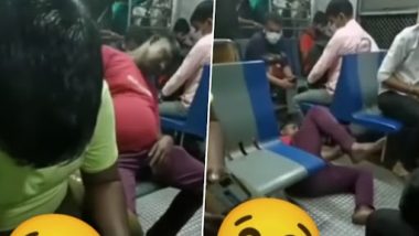 Viral Video: थका हुआ शख्स लोकल ट्रेन में सोते समय सीट से गिरा धड़ाम, उसके बाद जो हुआ...देखें वीडियो