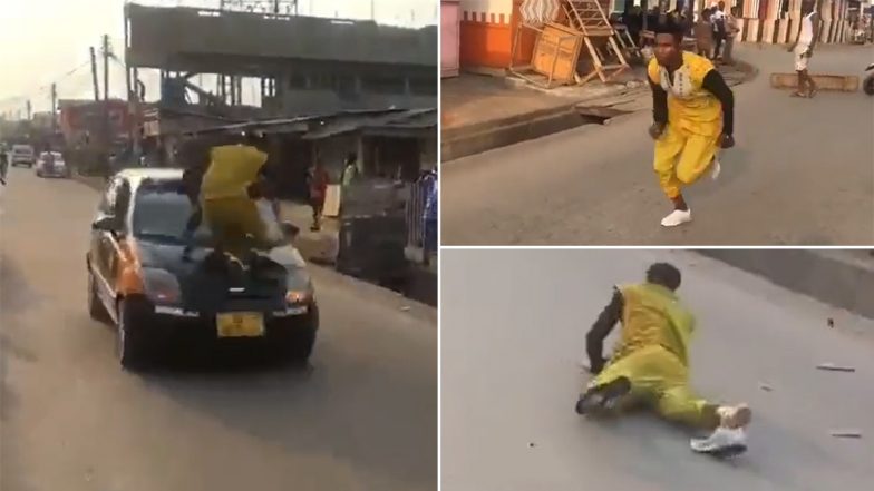 Stunt Goes Wrong: चलती हुई कार पर स्टंट करना शख्स को पड़ा महंगा, संतुलन बिगड़ते ही हुआ ऐसा हाल (Watch Viral Video)