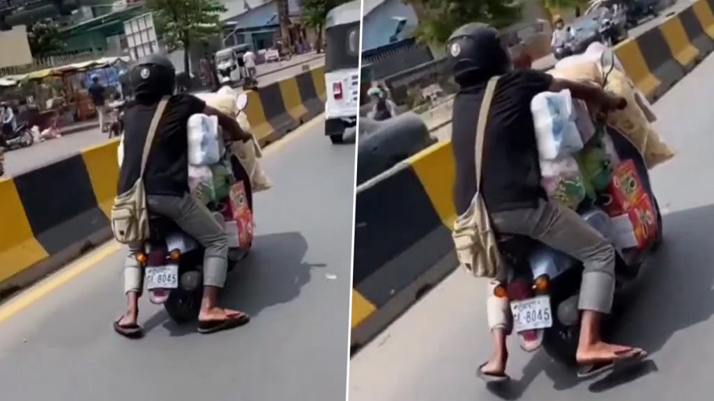 शख्स ने स्कूटी पर भर लिया इतना सामान कि नहीं रही बैठने की जगह, Viral Video देखकर चकरा जाएगा आपका दिमाग
