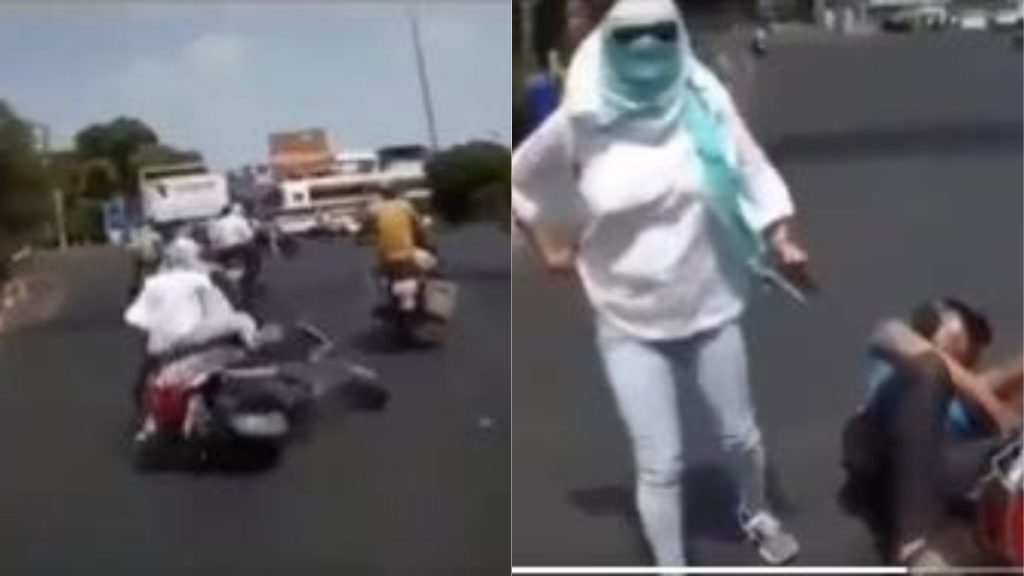 महिला ने अपनी गलती का ठिकरा किसी और पर फोड़ा, स्कूटी से गिरने के बाद जबरन बाइक सवार से करने लगी झगड़ा