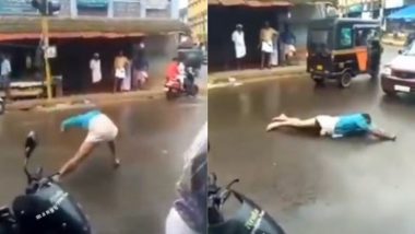 Viral Video: शराब के नशे में धुत होकर बीच सड़क पर अजीबो-गरीब हरकतें करने लगा शख्स, वीडियो हुआ वायरल