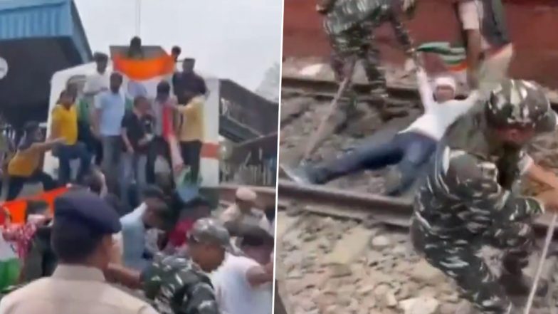 कांग्रेस कार्यकर्ताओं ने दिल्ली के शिवाजी ब्रिज रेलवे स्टेशन पर रोकी ट्रेन, ब्लॉक किया रेलवे ट्रैक