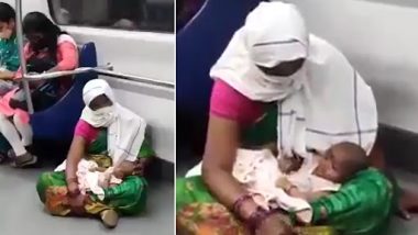 Viral Video: दिल्ली मेट्रो में बच्ची को फर्श पर लेकर बैठी महिला क्लिप वायरल, वीडियो देख भड़के नेटीजंस