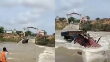 Viral Video: कच्छ में नदी को पार करते समय हुआ हादसा, ट्रैक्टर समेत पानी में गिरा शख्स, बाल-बाल बची जान