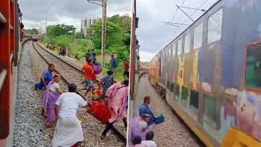 सामने से आ रही थी तेज रफ्तार ट्रेन, फिर भी महिला ने अपना सामान लेने के लिए किया ट्रैक पार, देखें जानलेवा स्टंट का Viral Video