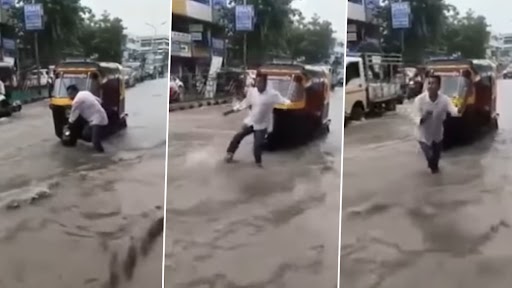 Viral Video: बारिश के पानी से डूबी हुई सड़क पर रिक्शा रोक कर अचानक डांस करने लगा ड्राइव, देखें वीडियो