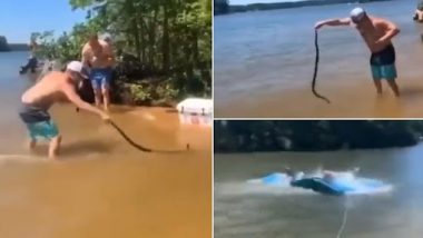 Viral Video: शख्स ने पानी रेंगते हुए सांप को पकड़कर फेंका दूर, जा गिरा लगों पर, देखें वीडियो