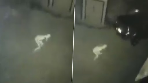 Real Ghost Caught on Camera? कैमरे में कैद हुआ भूत! सीसीटीवी में कैद हुई रहस्यमयी आकृति, वीडियो देख पैरों तले खिसक जाएगी जमीन