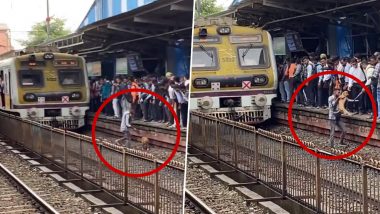 Viral Video: लोकल ट्रेन के नीचे आने से बाल-बाल बचा कुत्ता, जान पर खेलकर एक शख्स ने बचाई बेजुबान की जान