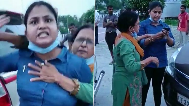 यूपी में महिला की दबंगई! कार से टक्कर के बाद चालक को धमकाया (Watch Video)