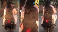 Viral Video: महिला की पीठ पर सवार होकर छिपकली ने की पूरे शहर की सैर, हैरान करने वाला वीडियो हुआ वायरल