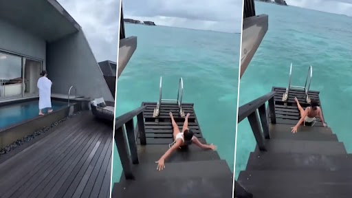 Viral Video: स्विमिंग पूल में जाने से पहले फिसलकर धड़ाम से गिरी महिला, देखें वीडियो