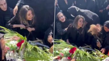 Mahsa Amini Death: हिजाब विरोधी प्रदर्शन के दौरान ईरानी बलों द्वारा मारे गए व्यक्ति की बहन ने कब्र पर बाल काट दिए (Watch Video)