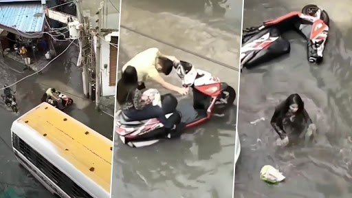 Funny Video: पानी से भरी सड़क पर गर्लफ्रेंड को स्कूटी पर बैठाकर सड़क पार कर रहा था बॉय फ्रेंड, उसके बाद जो हुआ...देखकर हो जाएंगे लोट पोट