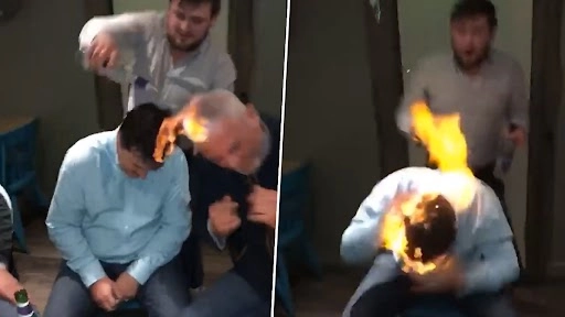 वोडका से पुरुषों का अपने बालों में आग लगाते हुए क्लिप वायरल, वीडियो देख इंटरनेट पर भड़के लोग