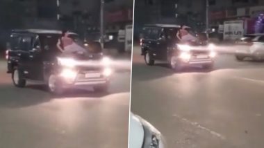 Noida Viral Video: स्कॉर्पियो की बोनट पर बैठकर स्टंट कर रही युवती का वीडियो वायरल, गाड़ी सीज