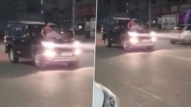 Noida Viral Video: स्कॉर्पियो की बोनट पर बैठकर स्टंट कर रही युवती का वीडियो वायरल, गाड़ी सीज