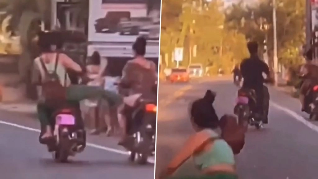 महिला को तुरंत मिला उसके कर्मों का फल, दूसरे बाइक सवार को किक मारने की कोशिश में खुद ही जमीन पर गिरी धड़ाम (Watch Video)