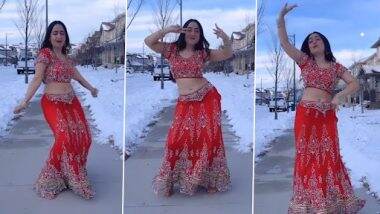 Desi Woman Dance: महिला ने लाल रंग के लहंगे में कनाडा में बर्फ से भरी सड़क पर 'छम्मक छल्लो' गाने पर किया डांस, वीडियो हुआ वायरल