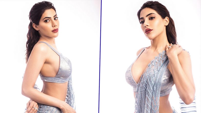 Nikki Tamboli ने सेक्सी आउटफिट में दिखाया बोल्ड अवतार, हॉटनेस से मचा रही हैं तहलका