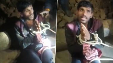 Madhya Pradesh: गुना में मोटर चोरी के आरोप में युवक के हाथ बांधकर लोगों ने बेरहमी से पीटा (Watch Viral Video)