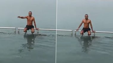 शख्स के नए रोजगार ने मचाया तहलका, पुण्य मिलने की गारंटी के साथ 10 रुपए में दूसरों के नाम की लगा रहा डुबकी (Watch Viral Video)