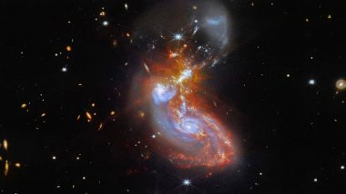 Two Galaxies Colliding: अंतरिक्ष में हो रहा दो गैलेक्सियों का मिलन, NASA ने जारी की दुर्लभ नजारे की शानदार फोटो