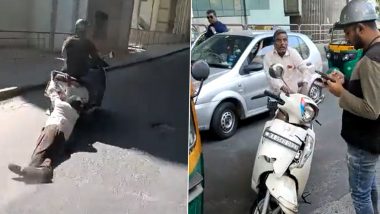 Bengaluru Shocker: Scooty rider hit the car in Bengaluru, after getting down from the car, the elderly driver tried to stop the young man and dragged him for a KM- Video