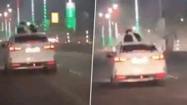 Viral Video: लखनऊ में बाइक के बाद अब कार की खुली छत पर रोमांस करते दिखे कपल, पुलिस तलाश में जुटी