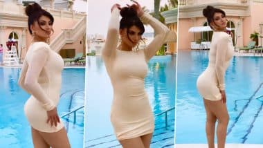 Urvashi Rautela ने स्किन टाइट व्हाइट बॉडीकॉन ड्रेस पहन स्विमिंग पूल के किनारे दिए सेक्सी पोज, यूजर्स का धक-धक हुआ दिल (Watch Video)