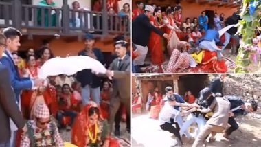 Funny Video: रस्साकशी के दौरान दूल्हा दुल्हन पर गिरा शख्स, हंसी से लोट पोट कर देने वाला वीडियो वायरल