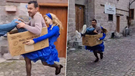 Video: हाई हिल्स में उंचाई से अपने पति को गोद में लेकर भागी महिला, वीडियो वायरल