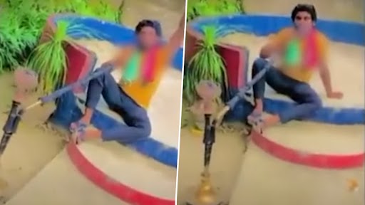 Video: यूपी के हापुड़ थाने के बाहर हुक्का पी रहे युवक गिरफ्तार, देखें वीडियो
