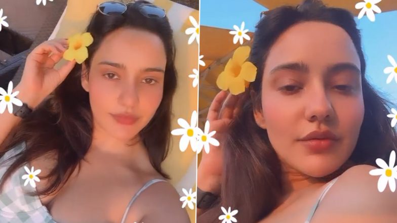 Neha Sharma Video: नेहा शर्मा ने बीच पर रिलैक्स करते हुए पोस्ट किया हॉट Video, फैंस भी हुए मदहोश