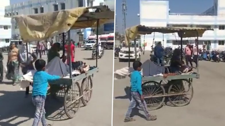 VIDEO: मध्य प्रदेश में एम्बुलेंस नहीं मिलने पर बीमार पिता को कड़ी धुप में ठेले पर लेकर अस्पताल पहुंचा 6 साल का मासूम