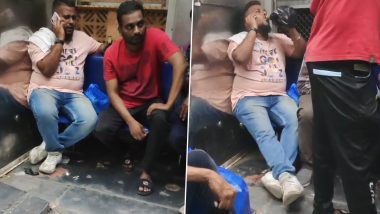 Man Drinking Alcohol in Local Train: लोकल ट्रेन के लगेज डिब्बे में शराब पीते शख्स का वीडियो वायरल, मुंबई पुलिस ने GRP से कार्रवाई करने को कहा- Watch Video