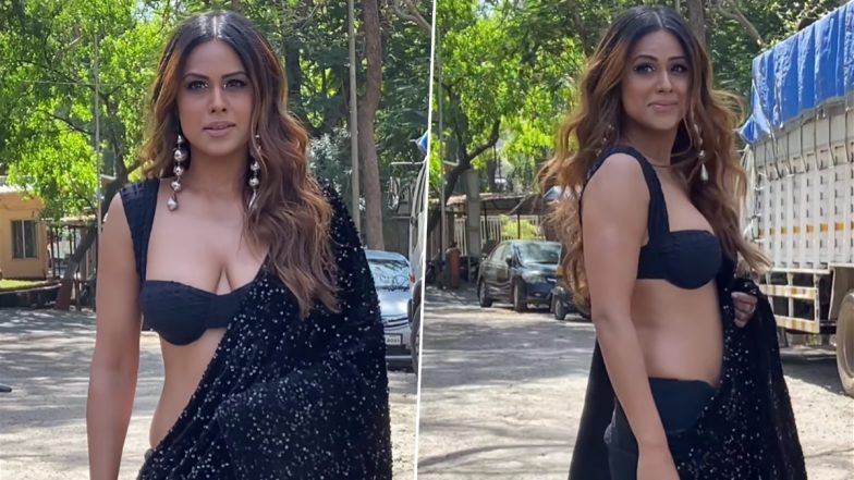 Nia Sharma का सिजलिंग ब्लैक साड़ी और डीप नेक ब्लाउज में दिखा स्टनिंग अवतार, एक्ट्रेस की हॉनेस ने बढ़ाया सोशल मीडिया का तापमान (Watch Video)