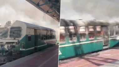 Fire Broke Out On Local Train: रेलवे स्टेशन पर खड़ी लोकल ट्रेन में लगी आग, कई बोगियां जलकर खाक, देखें वीडियो