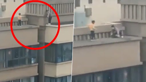 Scary Video: ऊंची इमारत की छत से दूसरी छत पर कूदते छोटे लड़के का डरावना क्लिप वायरल, देखें वीडियो