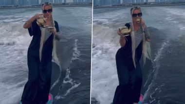 Viral Video: समंदर की लहरों के बीच सर्फिंग बोर्ड पर सवार होकर महिला ने ली चाय की चुस्की, वीडियो हुआ वायरल
