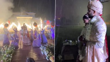 घनघोर बारिश के बीच शाही अंदाज में शादी की रस्में निभाते दिखे दूल्हा-दुल्हन, देखें Viral Video