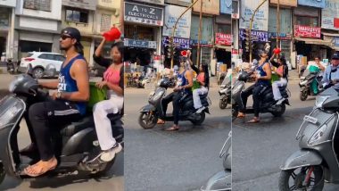 Bathing On Scooty: स्कूटी पर ही नहाने लगे लड़का-लड़की, VIDEO वायरल होने के बाद मुंबई पुलिस ने दर्ज किया केस