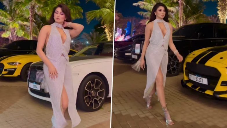 Urvashi Rautela ने सिल्वर कट-आउट ड्रेस पहन दिए किलर पोज, एक्ट्रेस की हॉटनेस ने बढ़ाया सोशल मीडिया का तापमान (Watch Video)