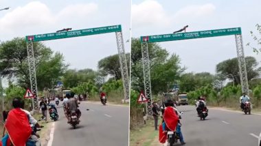 Drunk Man Does Push-Ups on High Signboard: नशे में धुत युवक ने साइन बोर्ड पर किया पुश-अप्स, वीडियो हुआ वायरल