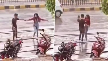 Couple Dancing in Rain: झमाझम बारिश में भीगकर डांस करता दिखा कपल, वीडियो हुआ वायरल