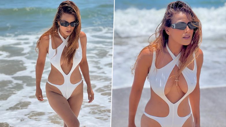 Nia Sharma ने व्हाइट सिजलिंग कट-आउट मोनोकिनी पहन समंदर में लगाई आग, एक्ट्रेस की हॉटनेस देख दीवाने हुए यूजर्स (View Pics)