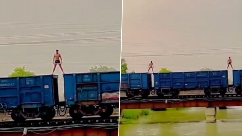 जान जोखिम में डाल कर मालगाड़ी पर स्टंट कर रहे थे दो युवक, पुलिस ने सिखाया सबक (Watch Video)