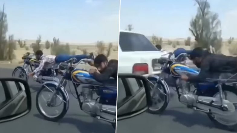 बीच सड़क चलती बाइक पर लेटकर स्टंट करना पड़ा भारी, अगले ही पल हुआ कुछ ऐसा... Viral Video देख उड़ जाएंगे होश