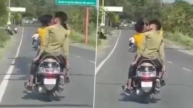 Guys Kissing in UP: चलती स्कूटी पर रोमांस करने लगे लड़के, किस करने का VIDEO वायरल, एक्शन ले सकती है पुलिस