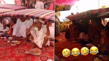 दावत खाते समय होने लगी जोर की बरसात, बारातियों ने बचने के लिए किया ऐसा इंतजाम कि छूट जाएगी आपकी हंसी (Watch Viral Video)